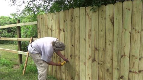 how to install wood fence